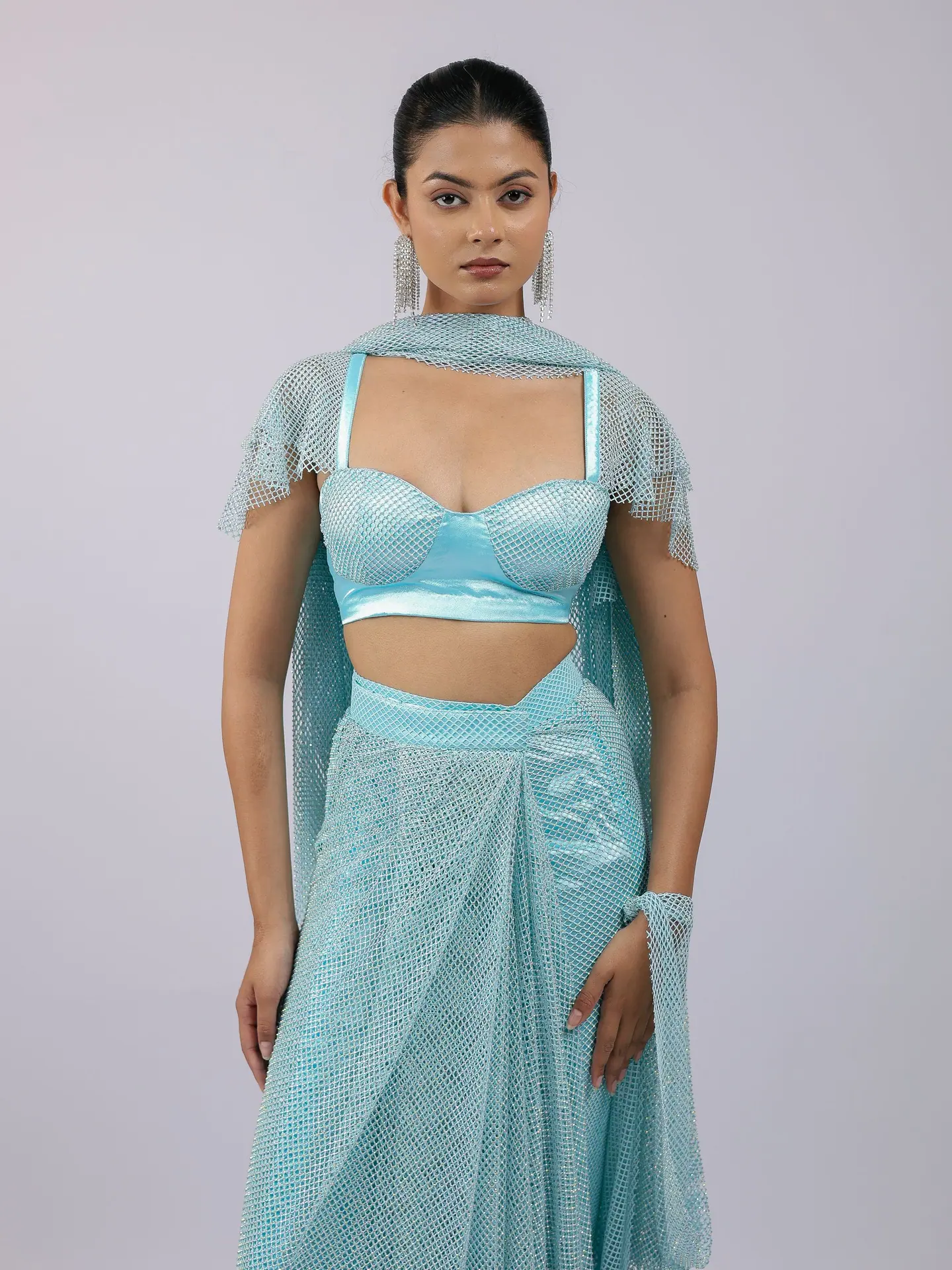 Aqua crystal bralette with draped skirt, waist-up