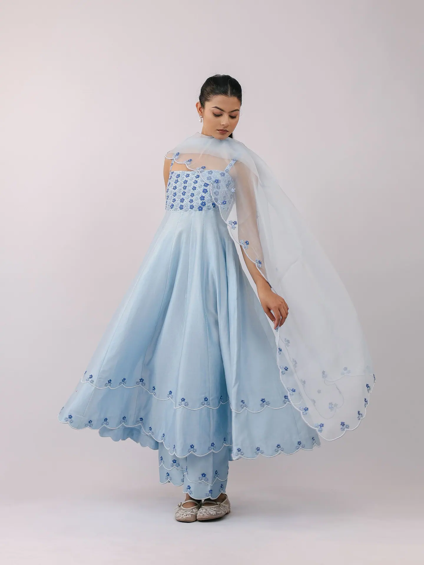 Powder-blue anarkali with embroidered yoke, dupatta spread wide