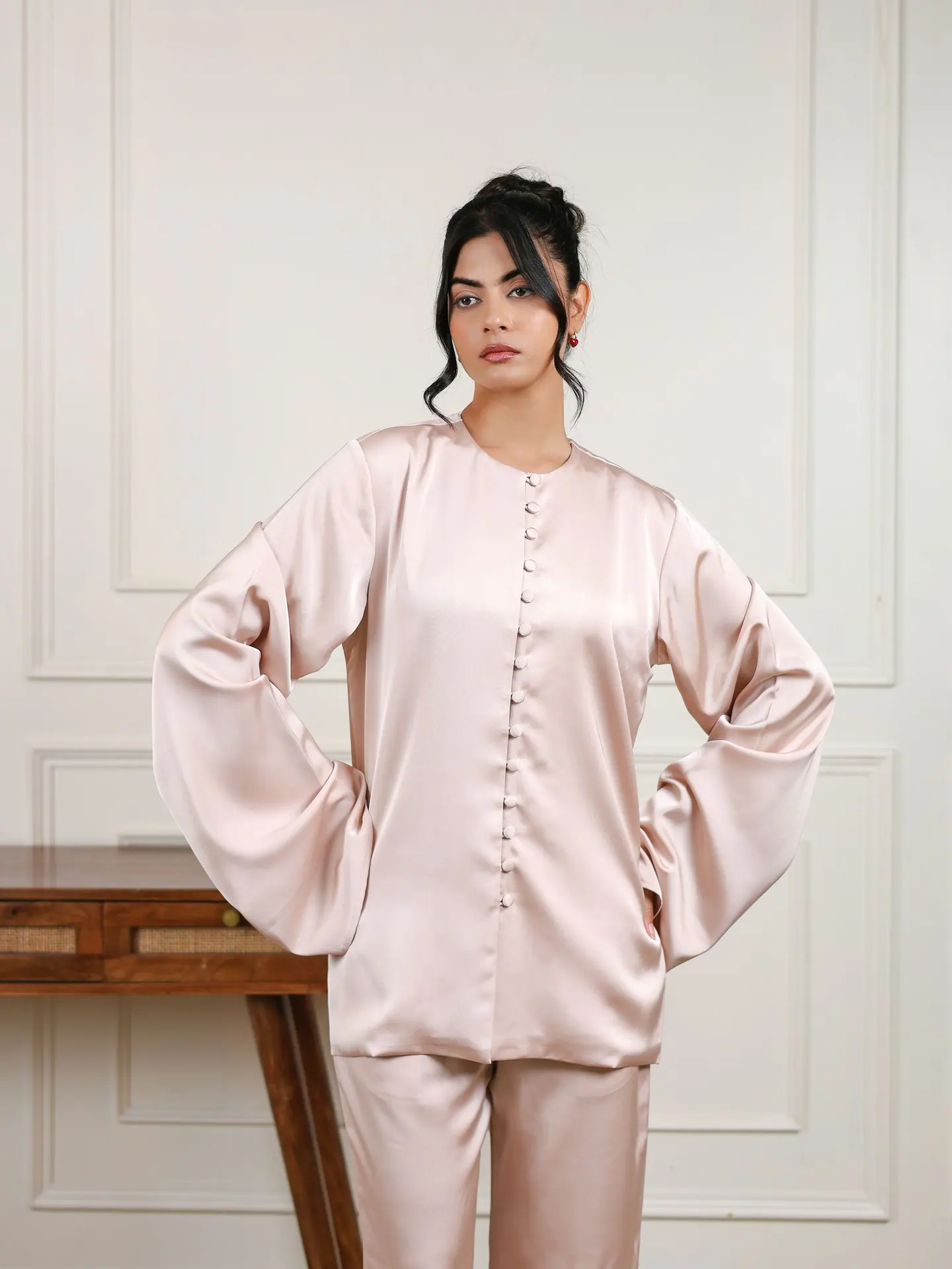 Champagne satin co-ord, waist-up with sleeves spread