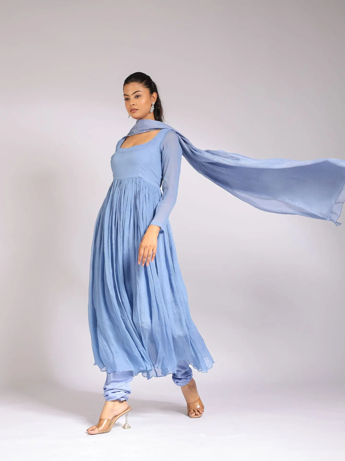 Cornflower anarkali with dupatta streaming behind