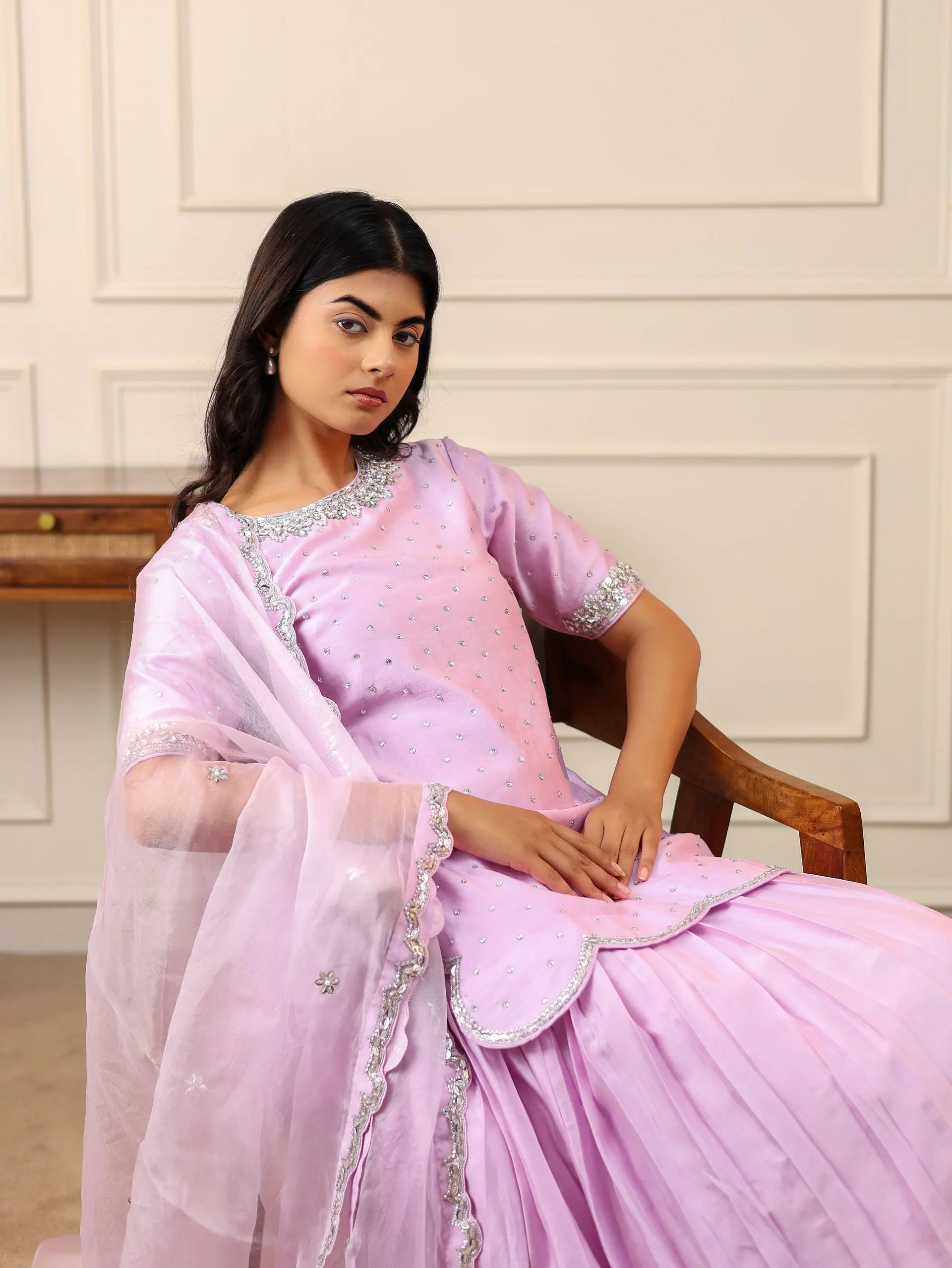 Lilac anarkali, seated with dupatta over the shoulder