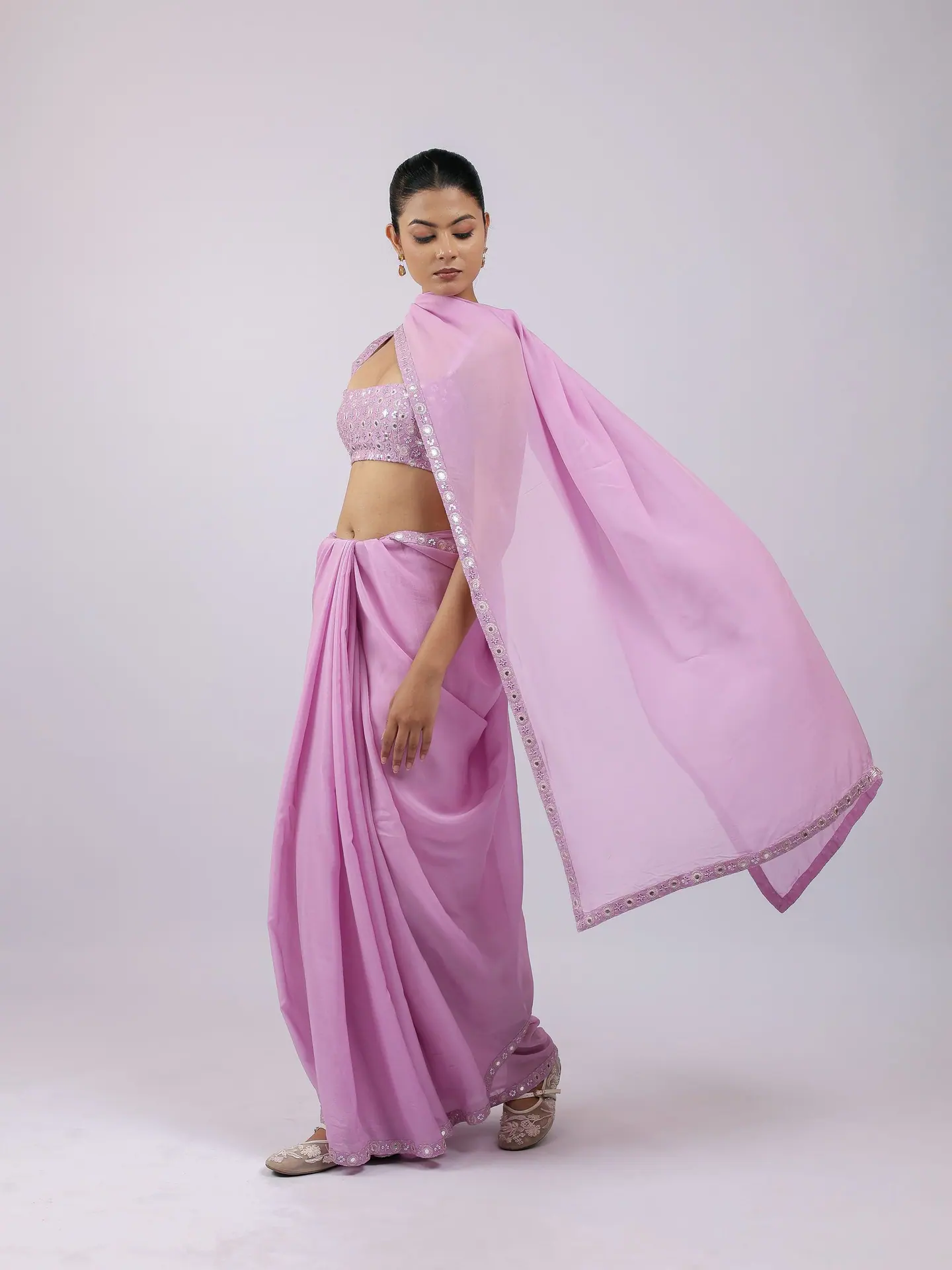 Lilac pre-draped saree with mirror bralette, pallu in flight