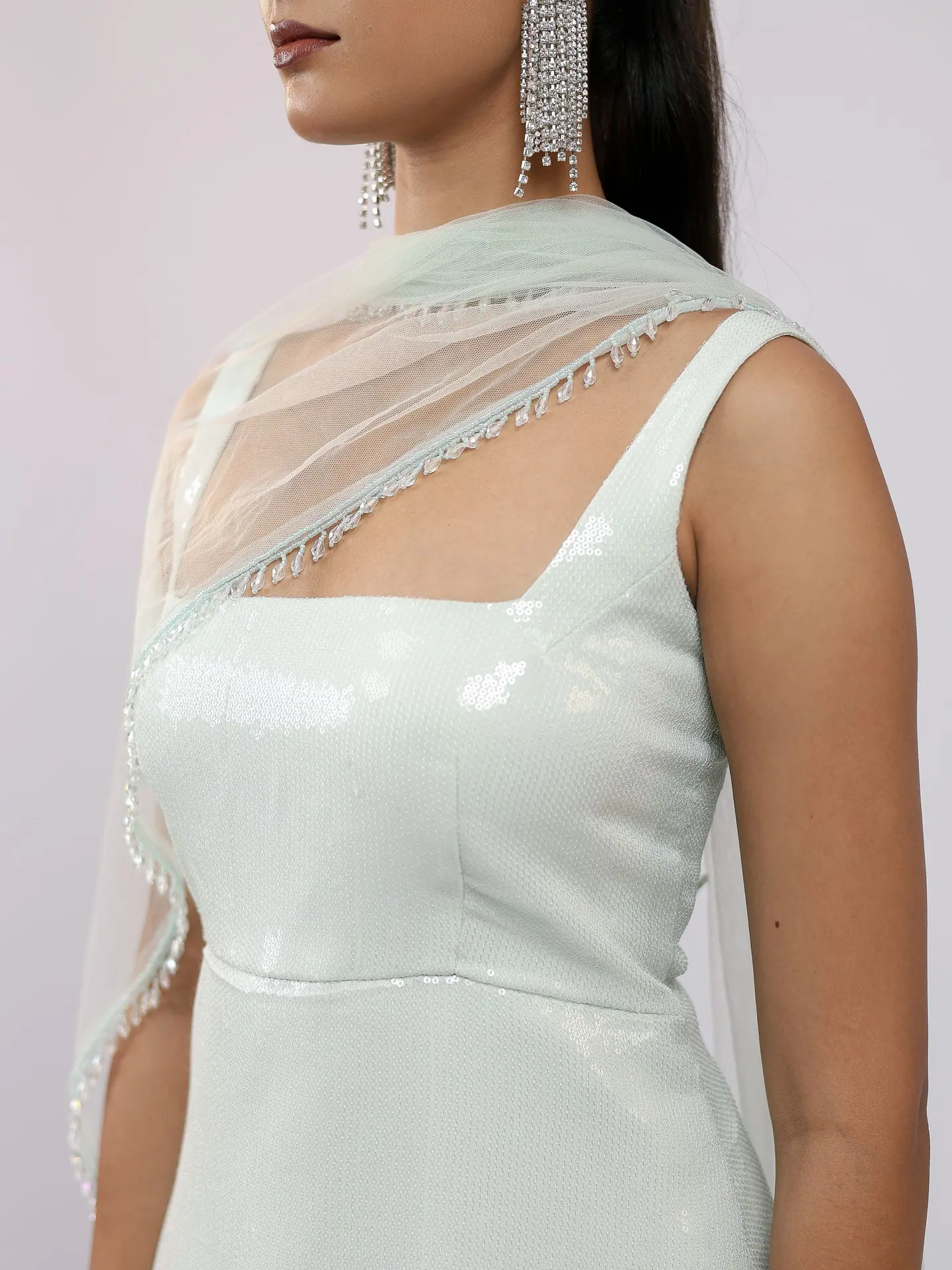 Close detail of mint sequins and the crystal-edged dupatta