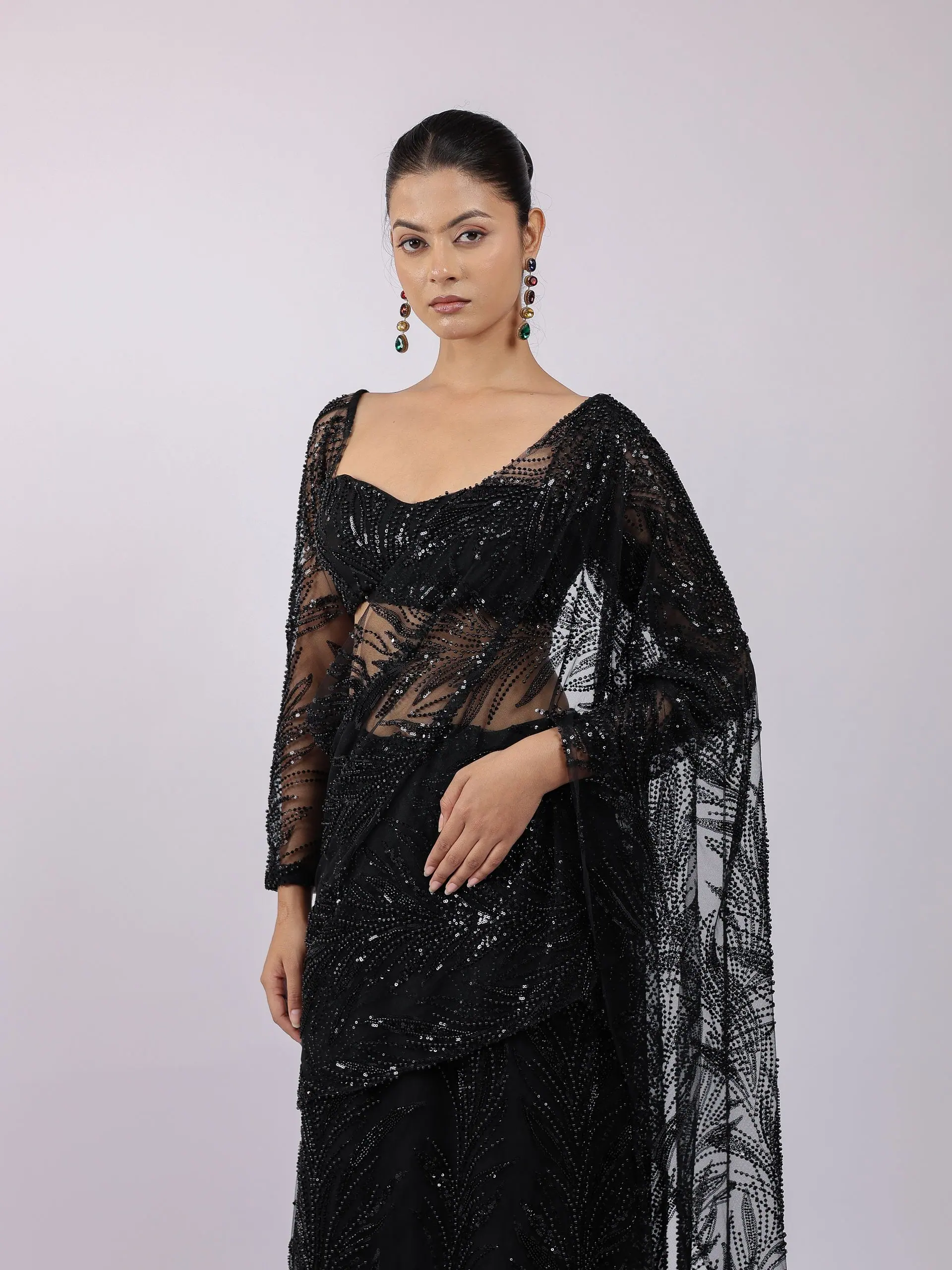 Black sequin saree, three-quarter portrait
