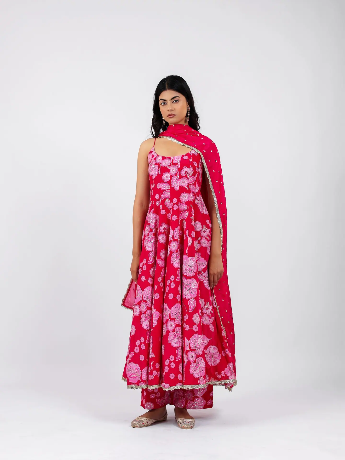 Rani-pink floral anarkali with a bandhani dupatta, full length