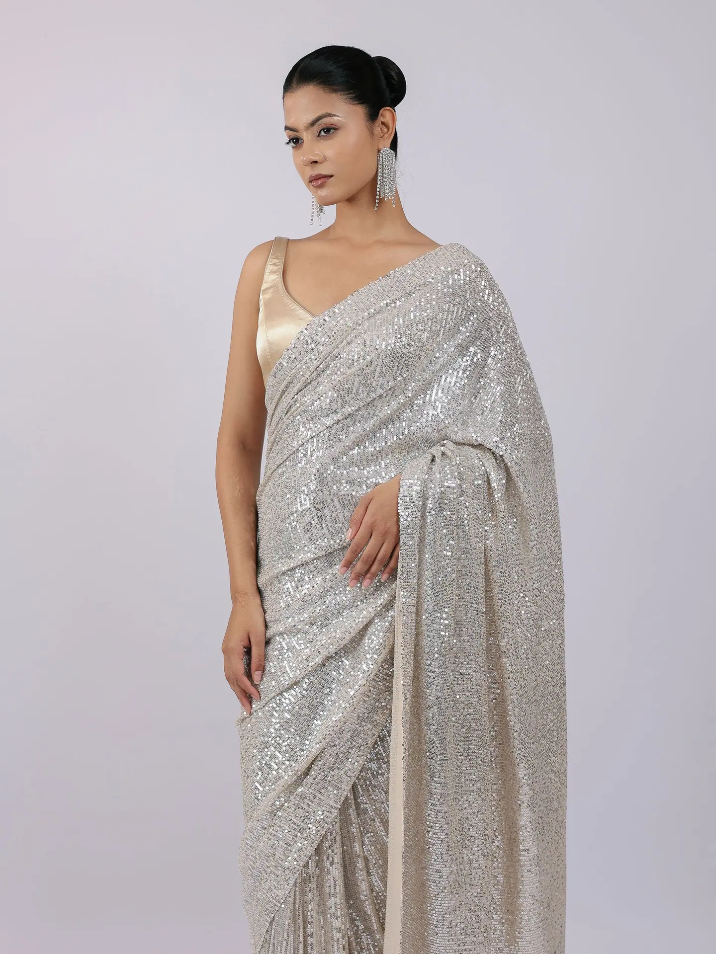 Silver sequin saree, waist-up