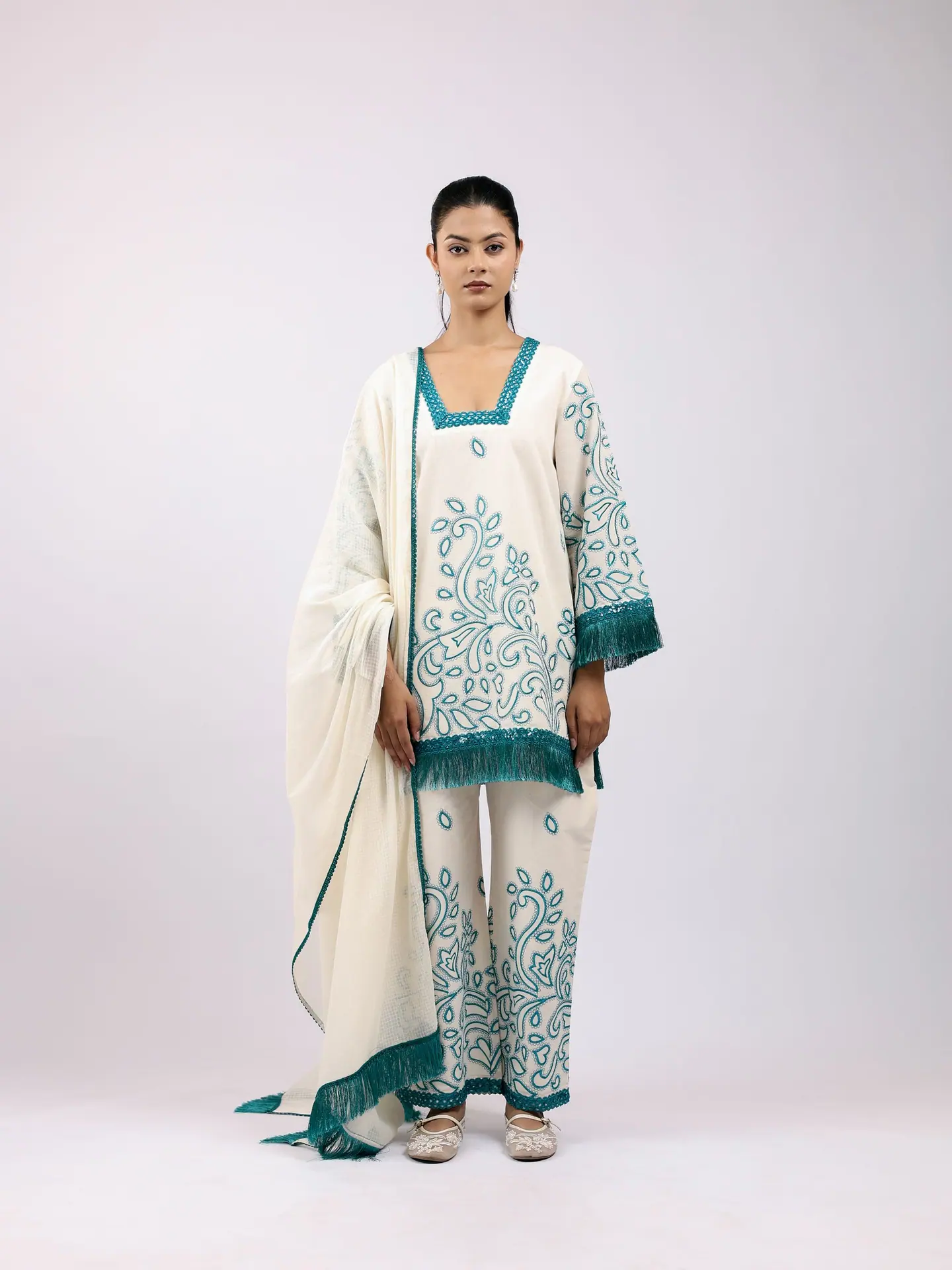 Ivory kurta set with teal vine embroidery and fringed dupatta, full length